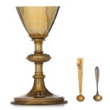 Three 20thC Gothic Revival type silver, gilt silver and silver-plated and gilt brass chalices, H 22,