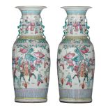 A pair of Chinese famille rose 'Guanyin on qilin' vases, 19thC, H 59,5 cm