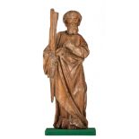 An oak sculpture of a saint leaning on a stick, probably German, 16thC, H 43 cm