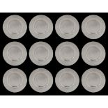 A set of 12 silver place plates, ¯ 31 cm - total weight: ca. 7.900 g