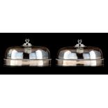 (BIDDING ONLY ON CARLOBONTE.BE) A pair of silver-plated meat covers, H 26 cm