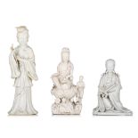 Two Chinese Dehua blanc-de-chine figures of a seated Guanyin, 17th - 20thC, H 22 - 26,5 cm - added a