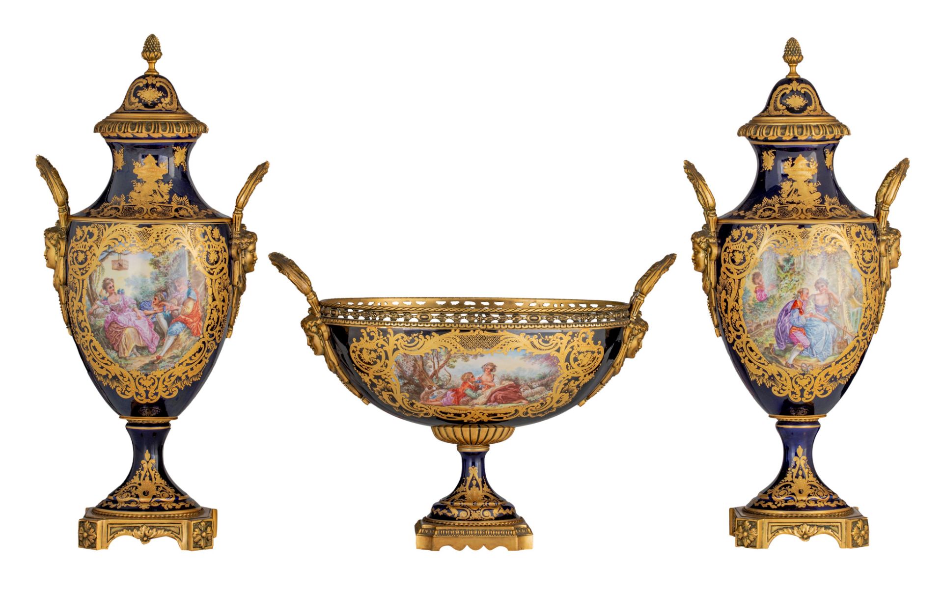 A three-piece SËvres type garniture set, with hand-painted roundels, H 34 - 59 cm