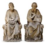 A pair of patinated reconstituted stone sculptures of seated Evangelist, in the style of the 15thC,