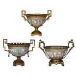 Three Chinese Canton famille rose punch bowls, all with gilt metal mounds, Tallest H 35,3 cm