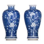 A Chinese blue and white 'Prunus on cracked ice' baluster vase, 19thC, H 31 cm