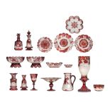(BIDDING ONLY ON CARLOBONTE.BE) A large collection of red Bohemian glass items, with etched decorati