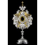 An imposing French silver and gilt silver sunburst monstrance, Paris, 1809-1819, 800/000, H 74 cm -