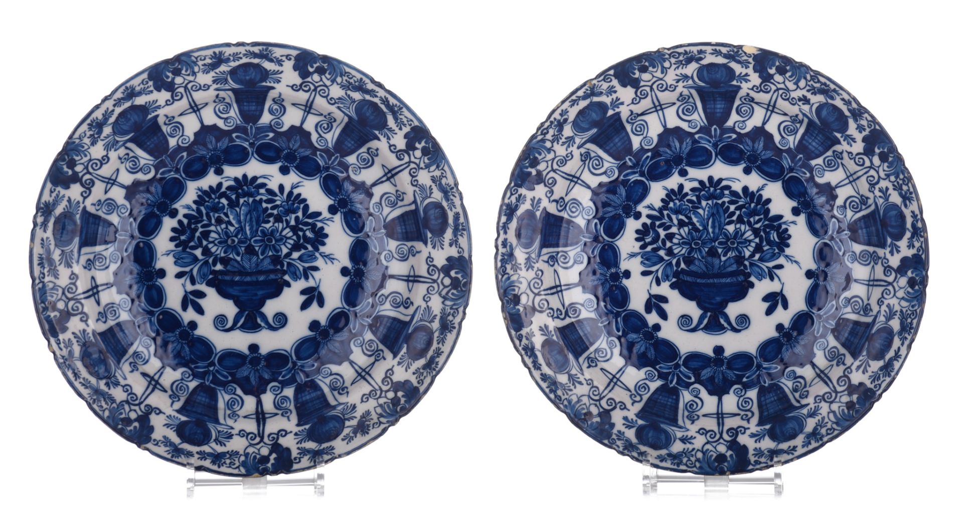 A collection of six Delft blue and white flower basket chargers, marked 'De Klauw', 18thC, ¯ 35 cm - Image 2 of 10