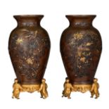 (BIDDING ONLY ON CARLOBONTE.BE) A pair of Japanese bronze vases, each raised on a gilt metal mount,