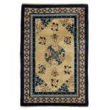 (BIDDING ONLY ON CARLOBONTE.BE) A Chinese woollen carpet, decorated with a central medaillon, 123,5