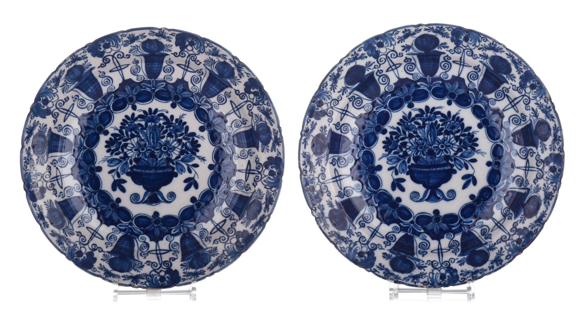 A collection of six Delft blue and white flower basket chargers, marked 'De Klauw', 18thC, ¯ 35 cm - Image 4 of 10