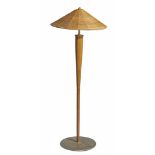 A vintage mid-century floor lamp, wood with a reed shade, H 157 cm