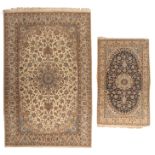 (BIDDING ONLY ON CARLOBONTE.BE) A Naim woollen rug, floral decorated, 206 x 313 cm, added a ditto sm