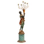 (BIDDING ONLY ON CARLOBONTE.BE) A decorative polychrome blackamoor torchËre, 20thC, H 197 cm