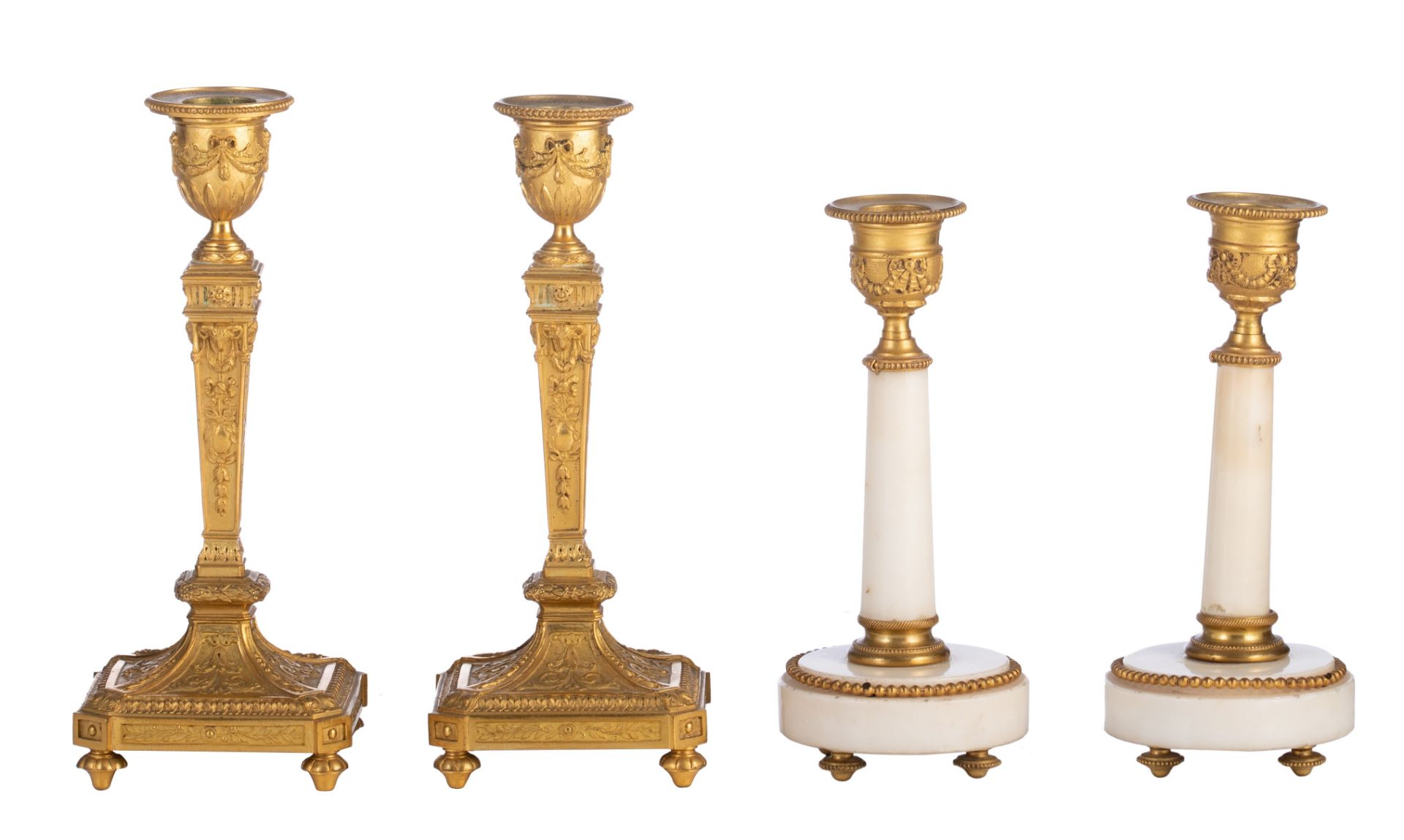(BIDDING ONLY ON CARLOBONTE.BE) Two pairs of Neoclassical candlesticks, H 17,5 - 21 cm