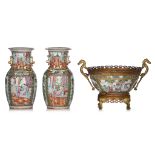 A collection of Chinese Canton famille rose vases and a punch bowl, 19thC, tallest H 32 cm
