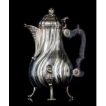 A French Louis XV silver chocolate pot with an ebonised wooden handle, hallmarked Lille, makers' mar