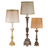 (BIDDING ONLY ON CARLOBONTE.BE) A collection of three floor candlesticks, transformed onto floor lam