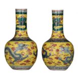 A pair of Chinese famille verte on yellow ground 'Dragon' bottle vases, H 36 cm