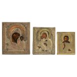 (BIDDING ONLY ON CARLOBONTE.BE) Three Eastern European icons with brass oklads, 17,5 x 22 - 27 x 31,