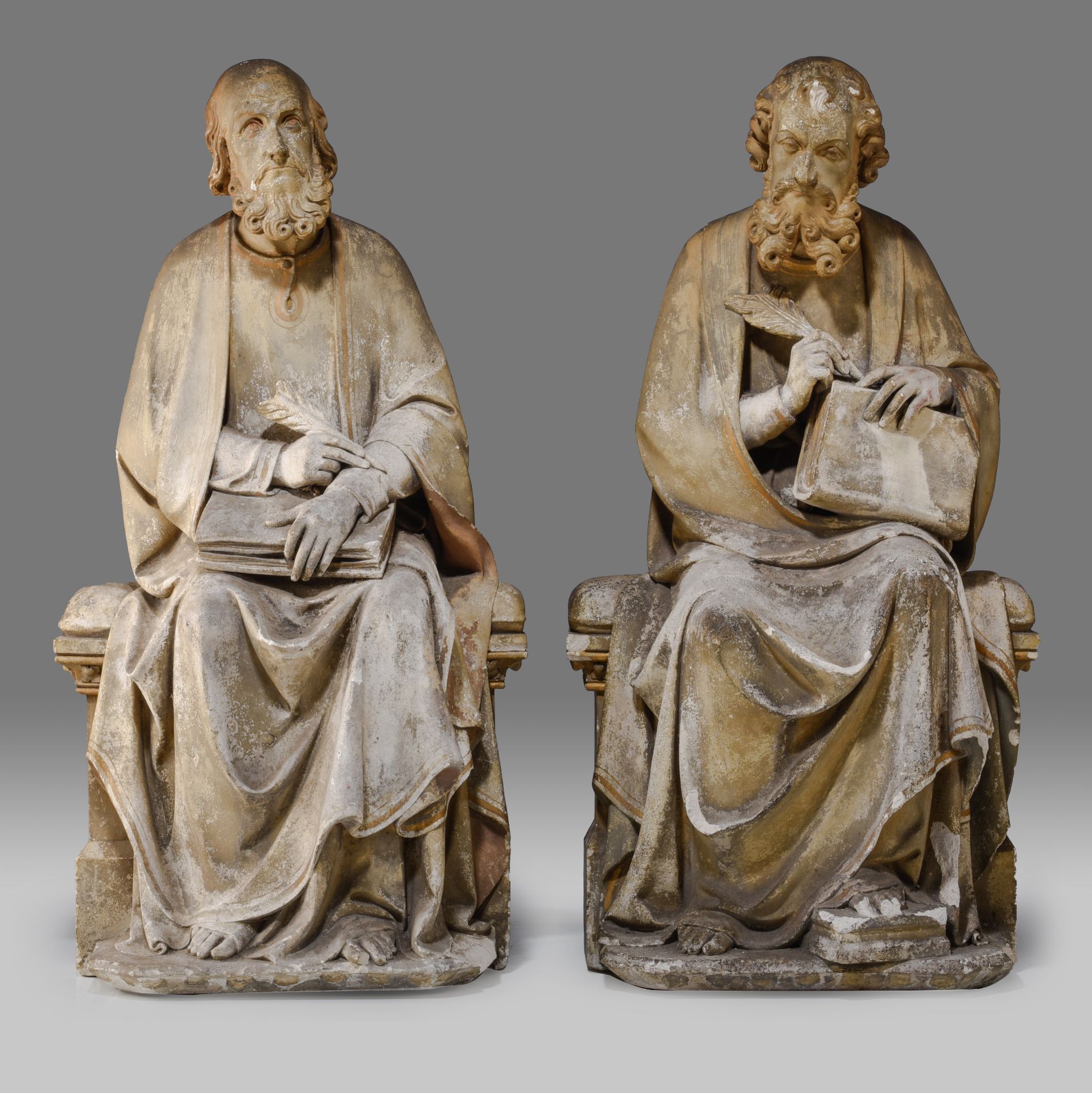 A pair of patinated reconstituted stone sculptures of seated Evangelist, in the style of the 15thC, - Image 2 of 12