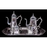 A four-part silver coffee and tea set, on a matching tray, ca 4439 g, H 13,5 - 26 cm, Tray: 33 x 55