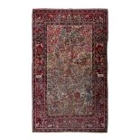 An antique Persian Ispahan rug, depicting the tree of life, 137 x 206 cm (+)