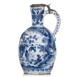 (BIDDING ONLY ON CARLOBONTE.BE) A large blue and white Delft jug with a chinoiserie decoration and a