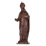A walnut sculpture of a bishop, 18th/19thC, H 90 cm