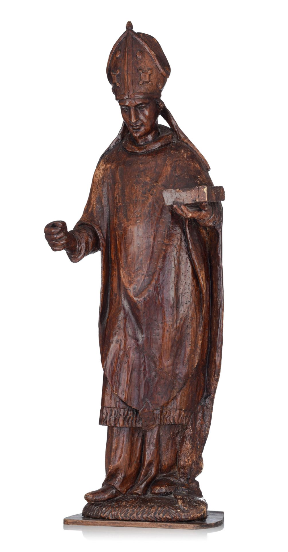 A walnut sculpture of a bishop, 18th/19thC, H 90 cm