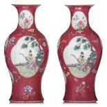 Two Chinese Republic period ruby ground sgraffito baluster vases, with a Qianlong mark, 20thC, H 44,