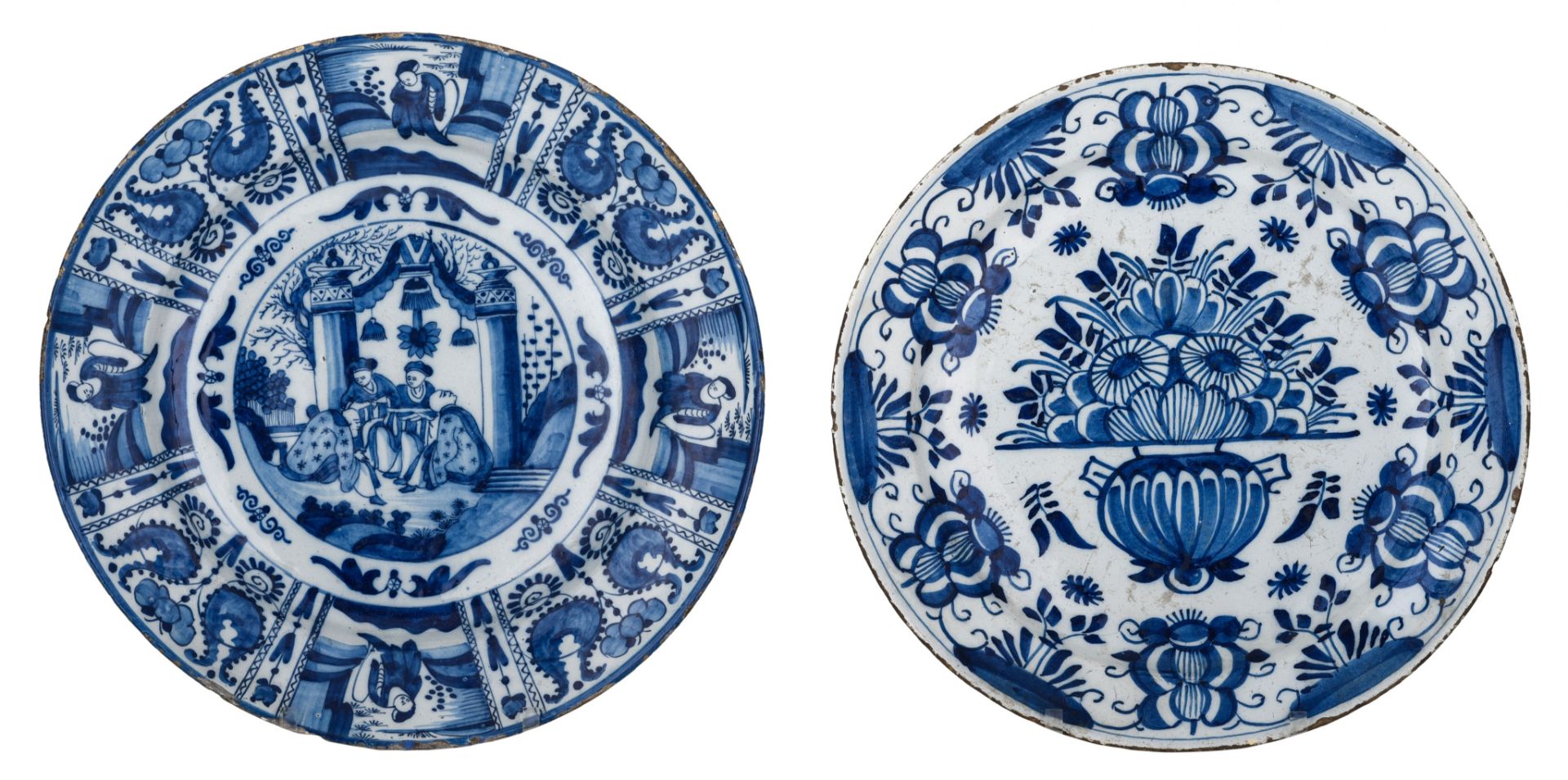 (BIDDING ONLY ON CARLOBONTE.BE) Two blue and white Delft chargers, 18thC, ¯ 34 - 35,5 cm
