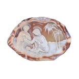 (BIDDING ONLY ON CARLOBONTE.BE) A cameo carved shell depicting the Holy Family, signed 'Trimarchi',