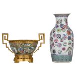A Chinese famille rose vase and a Canton punch bowl with gilt bronze mounts, both 19thC, Tallest H 4
