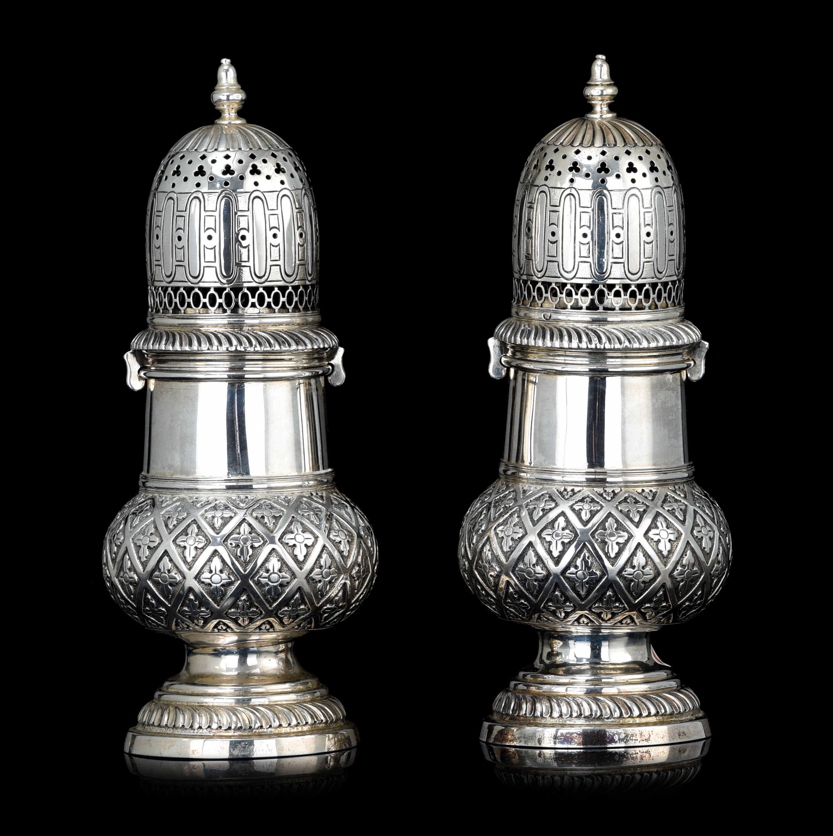 An imposing pair of silver casters, H 20,5 cm, ca 673 g