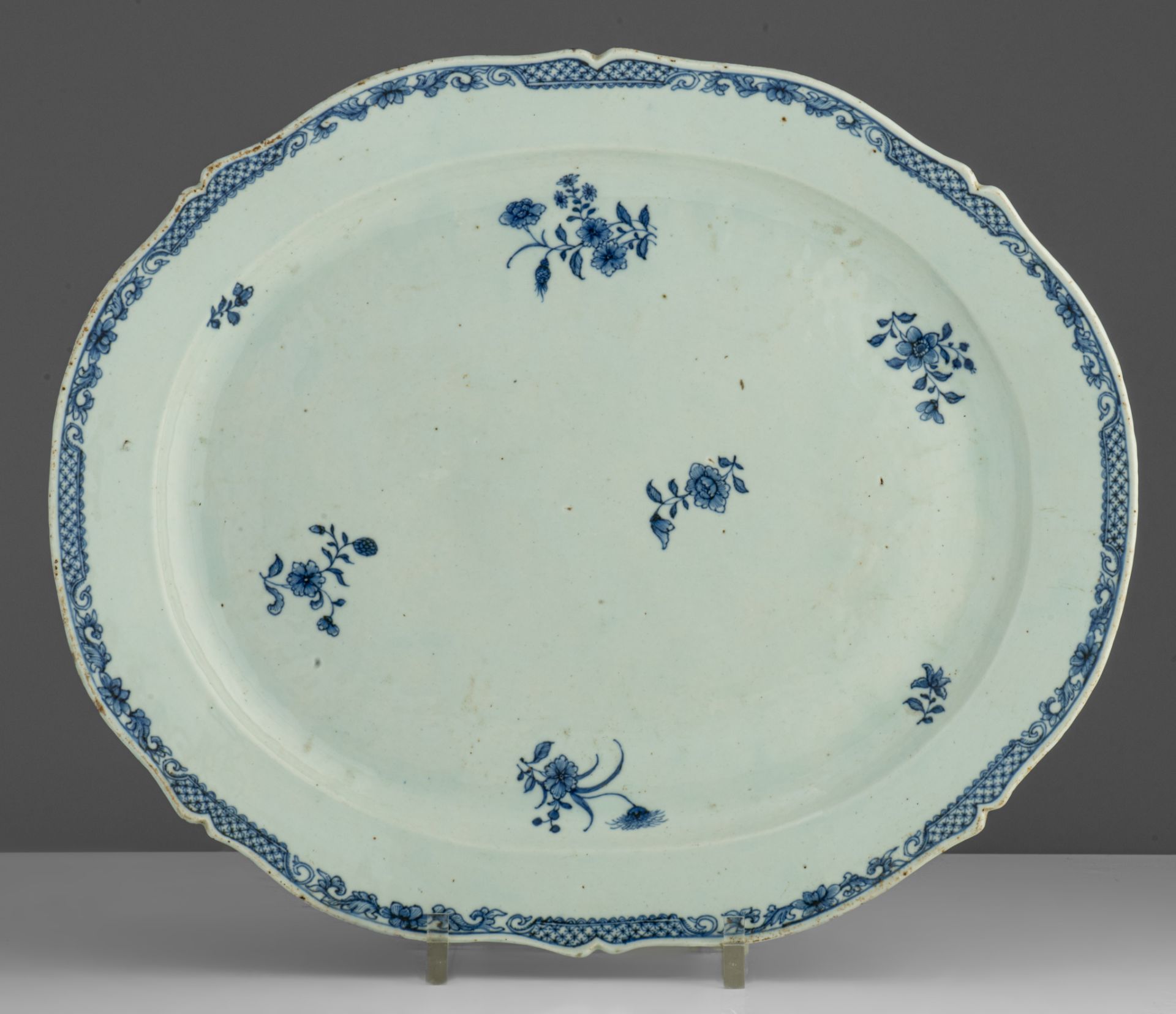 A series of four large Chinese blue and white floral decorated serving plates, 18thC, dia. 33 x 38,5 - Image 4 of 9