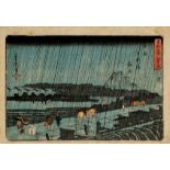 A Japanese woodblock print by Yoshitora, Yoshiwara Nihon zutsumi in rain, from the series "eight vie