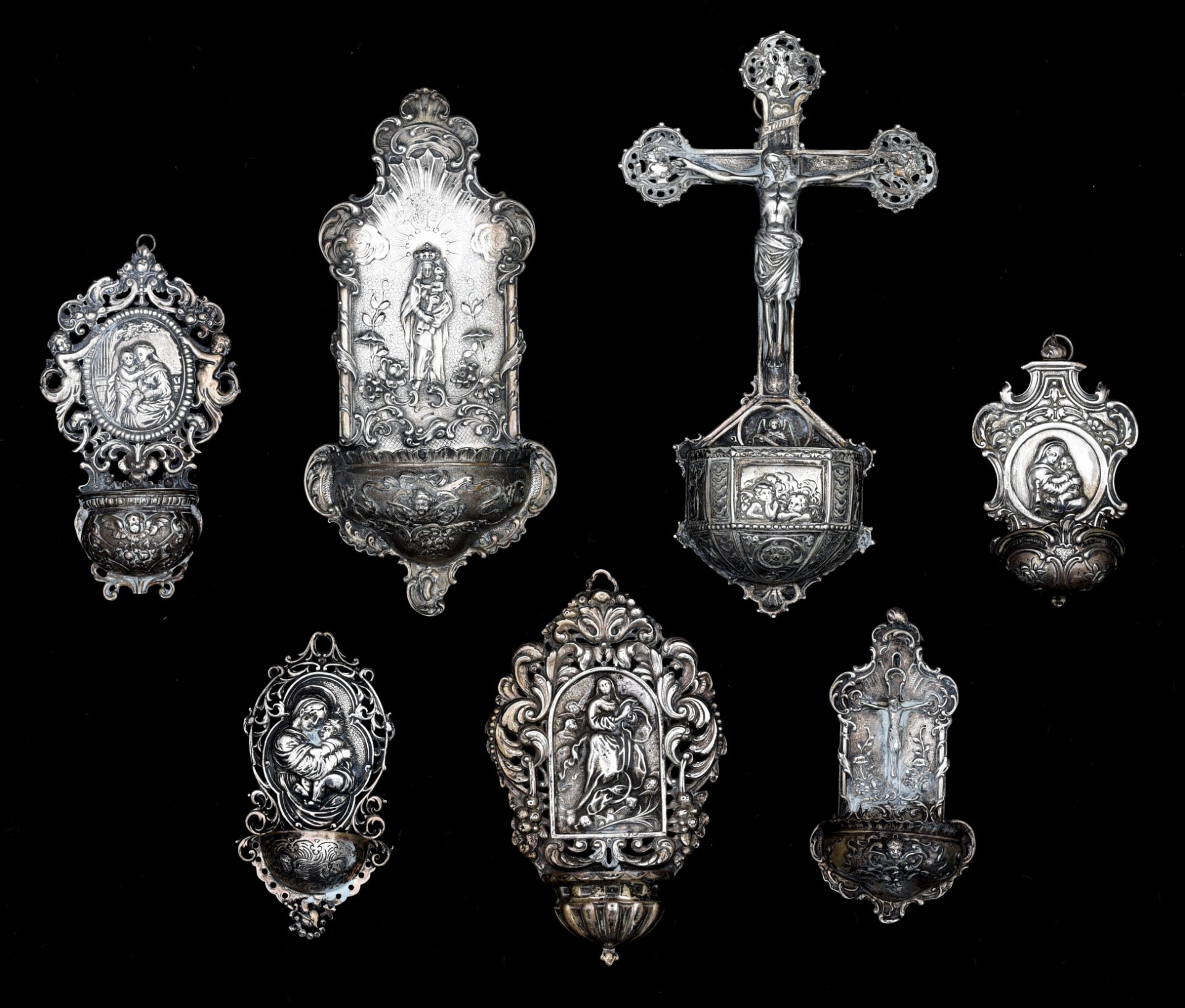 A collection of seven holy water fonts, H 12 - 26 cm, total weight: ca 780 g