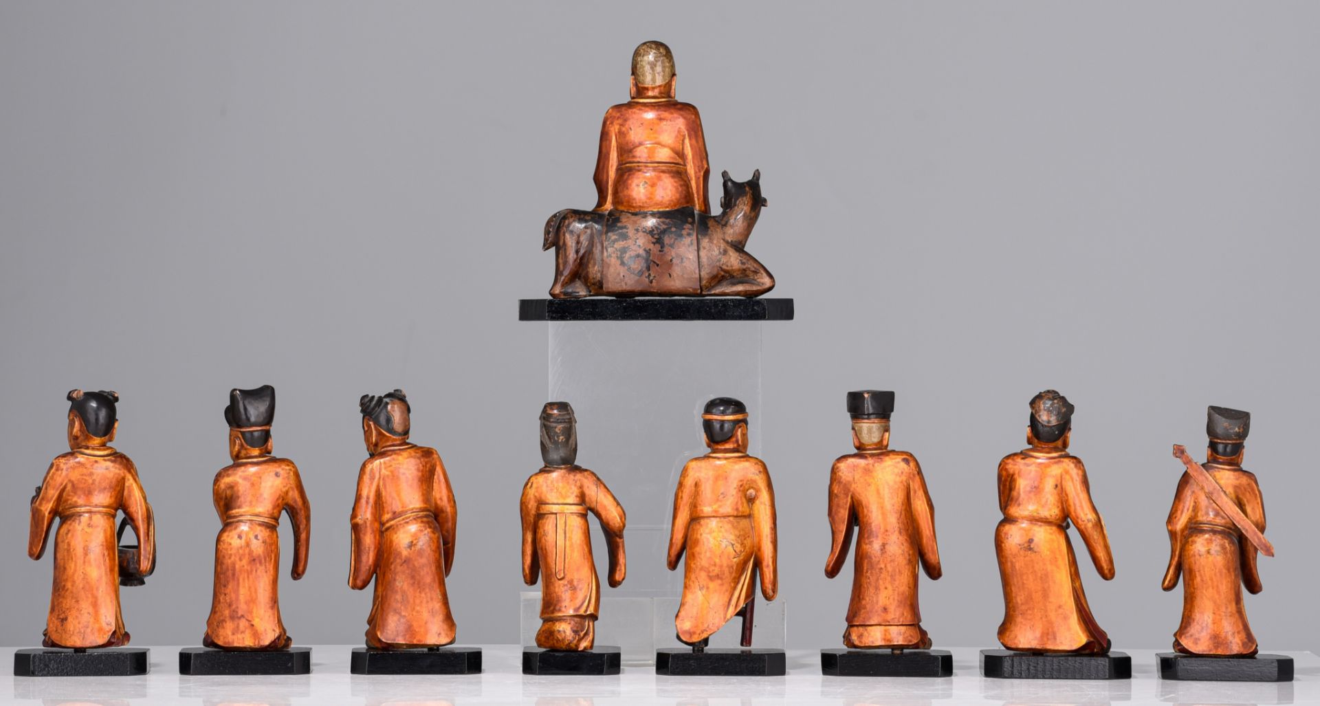 A set of nine Chinese gilt lacquered figures of the Eight Immortals and Shou Lou, 19thC, tallest H 1 - Image 4 of 9
