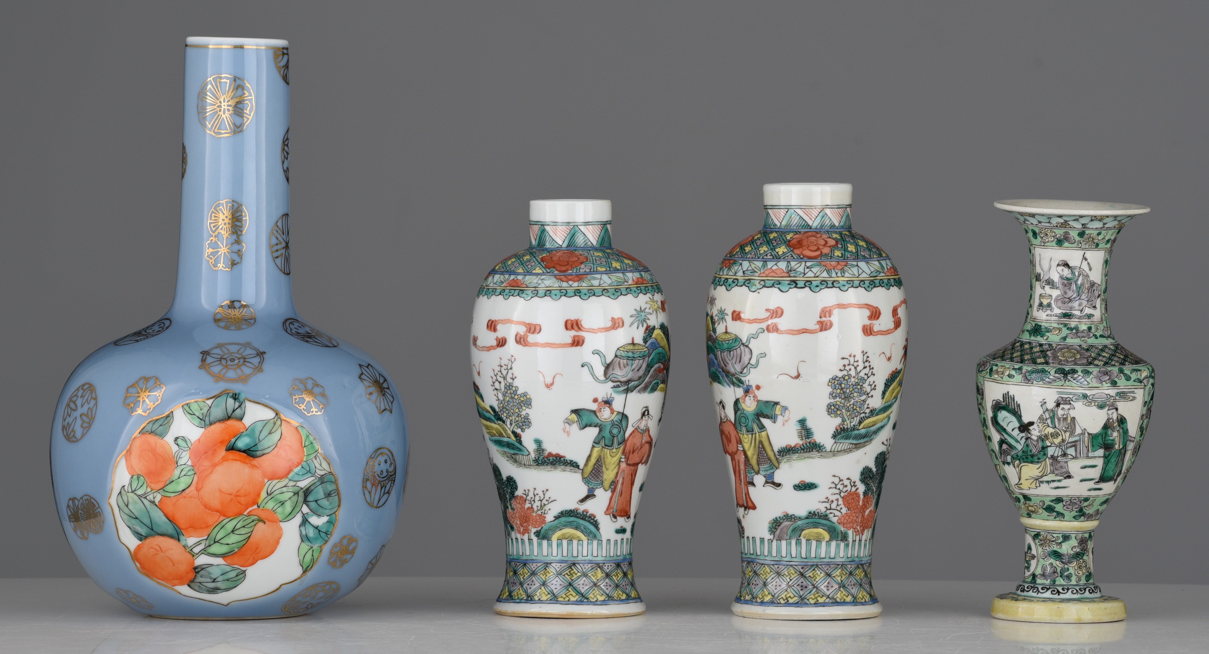 A collection of two Chinese famille verte vases and a famille rose bottle vase, Republic period/19th - Image 4 of 7