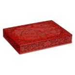 A Chinese carved cinnabar red lacquer box and cover, late Qing, 38 x 27,5 cm