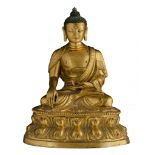 A Chinese gilt-bronze figure of Buddha Sakyamuni seated on a lotus throne, 18thC, H 15,7 cm - Weight