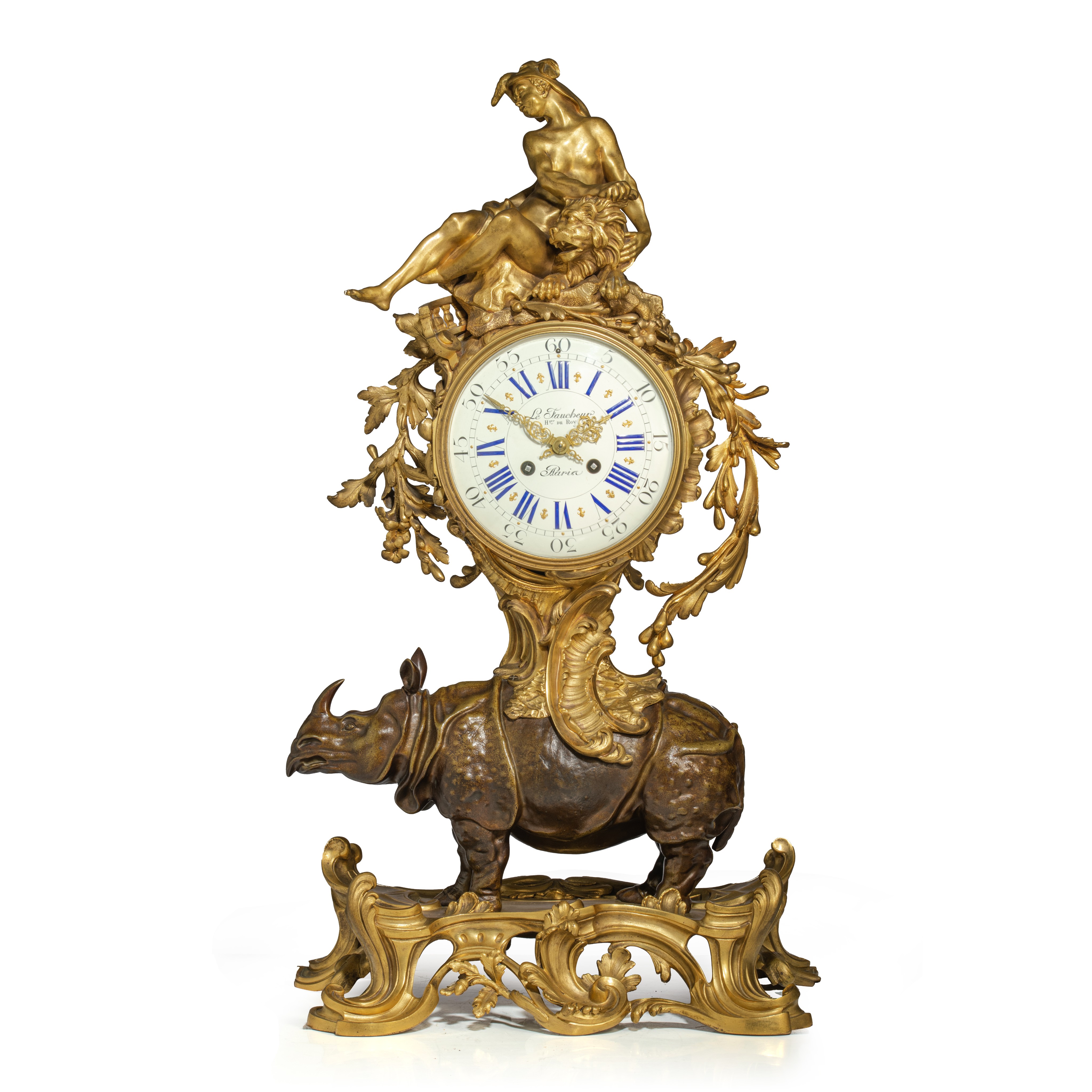 A very imposing Rococo style rhinoceros mantel clock, the dial signed 'Le Faucheur, Paris', H 77 - W
