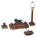 A Neoclassical rouge Griotte marble ink set, with gilt bronze mounts and a central patinated bronze