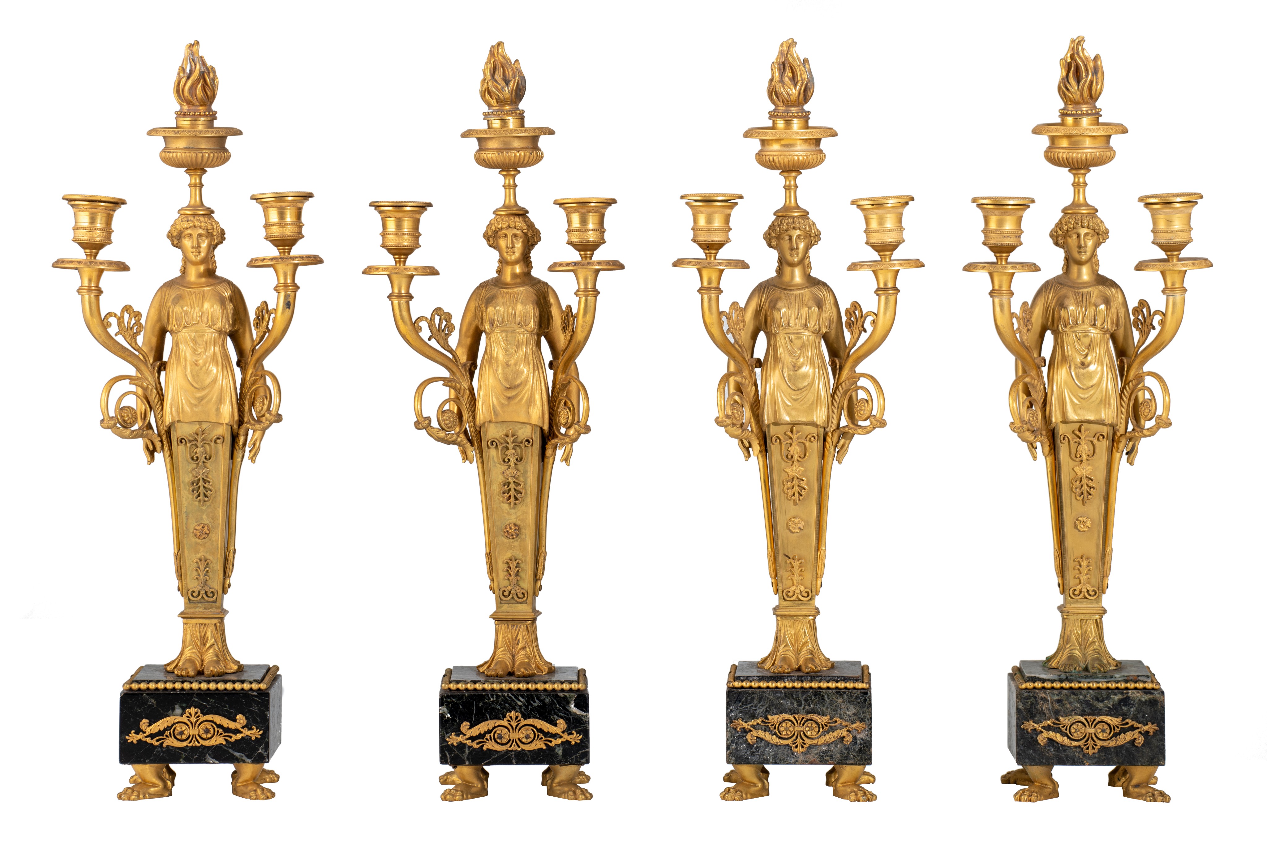 A set of four Empire style caryatid candelabras, gilt bronze on a vert de mer marble base, H 51,5 cm