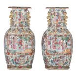 A similar pair of Chinese Canton famille rose vases, 19thC, H 43,5 cm