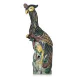 A Chinese model of a phoenix in famille verte glaze, Republic period, H 39,5 cm