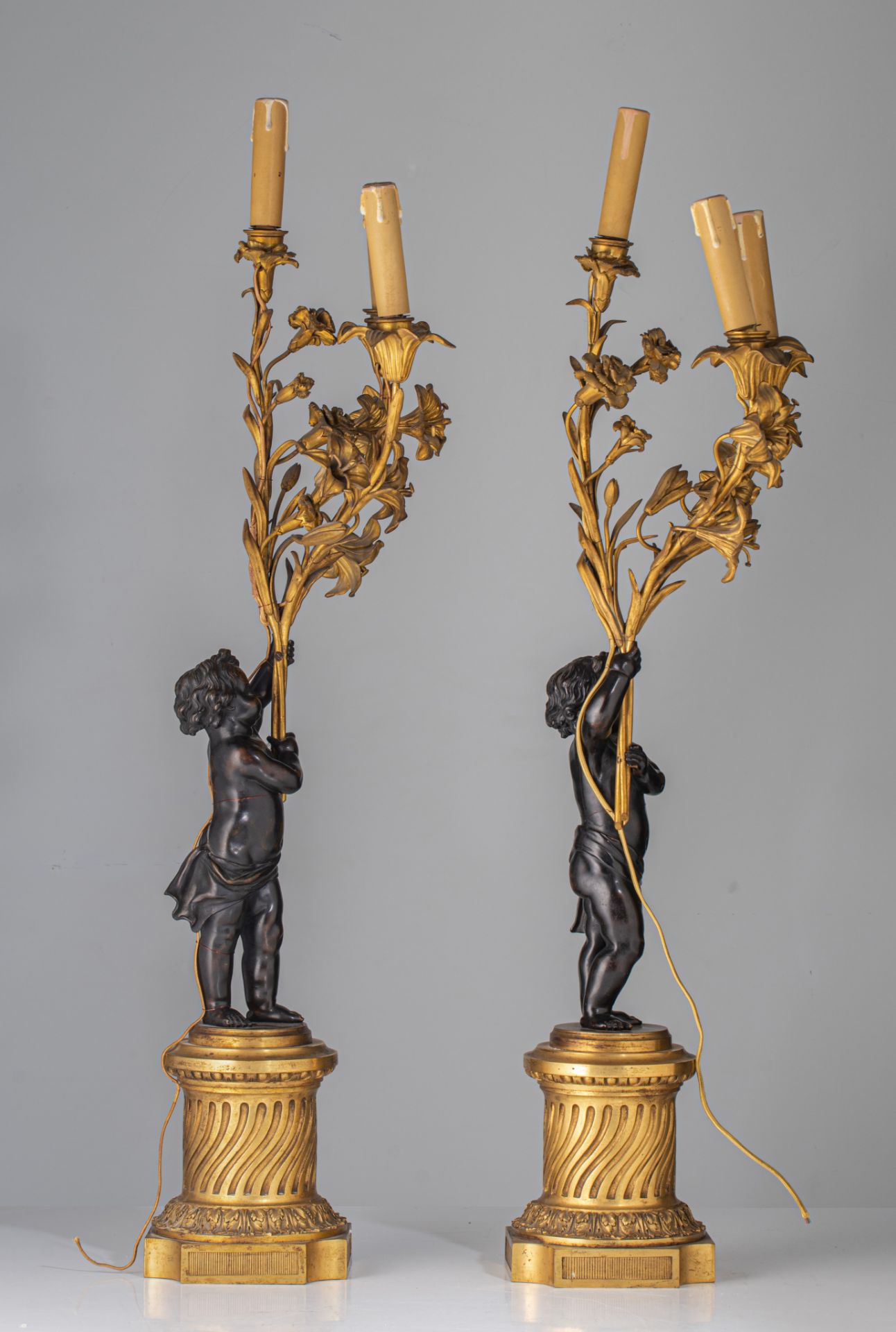 A pair of Neoclassical patinated and gilt bronze figural candelabras, H 80 cm - Image 5 of 7