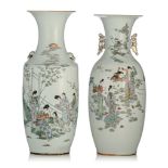 Two Chinese famille rose vases, paired with handles, the back with a signed text, Republic period, H